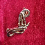 Elegant golden loop earrings with pearl detail