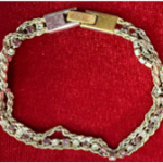 Elegant Twisted Gold and Silver Bracelet